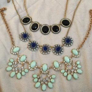 Three statement necklaces