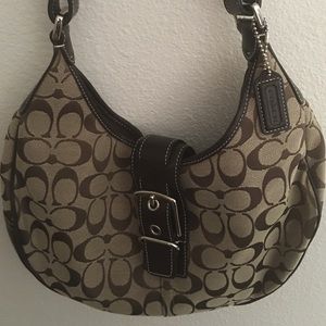 Brown and tan Coach shoulder bag