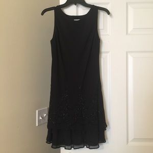 Beautiful beaded hem line drop waist black dress