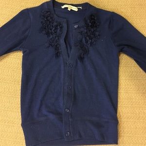 Blue flower ruffle sweater.