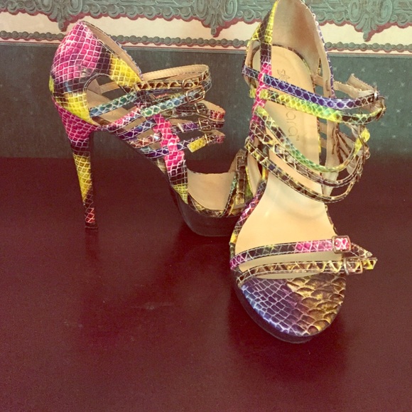 Multi-color snake skin stilettos.