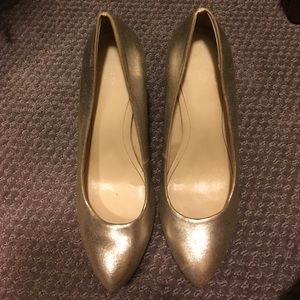 Calvin Klein gold heels with wood heel.
