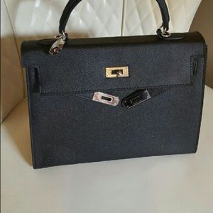 Epsom Kelly size 32 silver