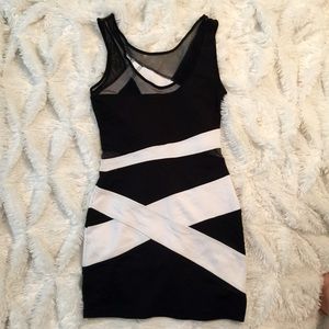 Bebe Mesh Accent Fitted Black and White Dress