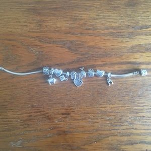 Pandora Bracelet with 8 charms included.