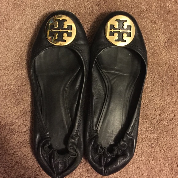 Tory Burch Gold emblem.