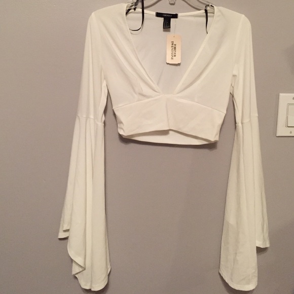White bell sleeve crop top
