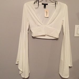 White bell sleeve crop top
