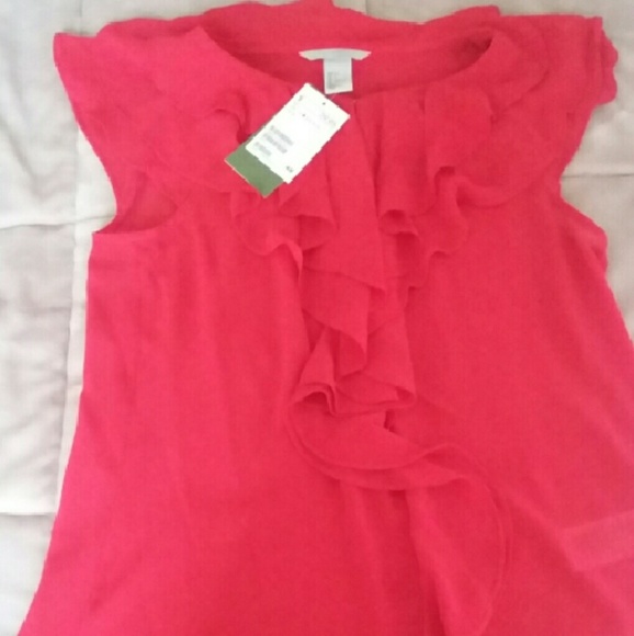 Red top with ruffle accents
