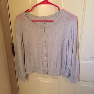 light gray cropped cardigan.