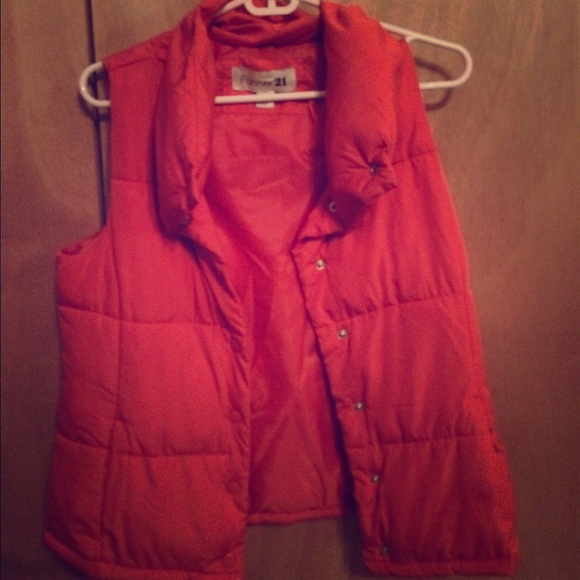 Orange puffy vest from Forever 21