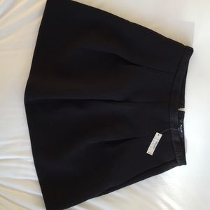 Black jacquard pleated mini skirt