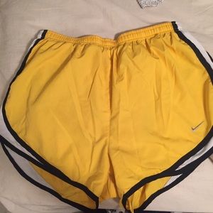 Black and yellow Nike shorts