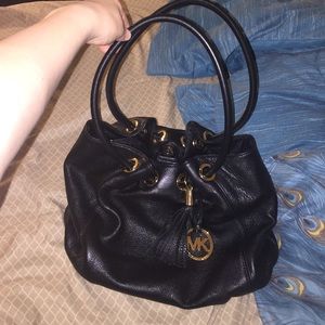 Michael Kors purse, wallet and card holder.