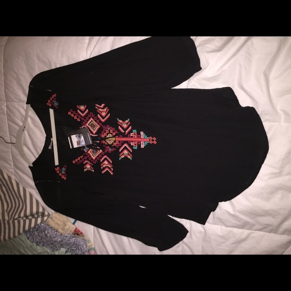 Black tunic with embroidered detail