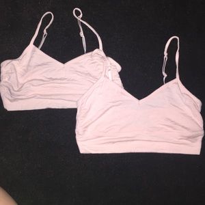 2 pink bralettes