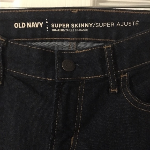 Old navy dark blue mid rise super skinny size 2