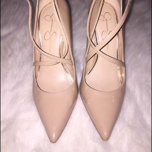 Nude cross strap pumps