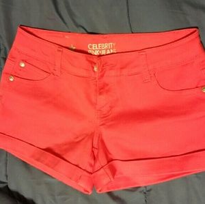 Coral pink cuffed short shorts