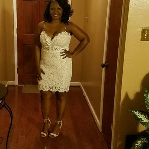 A beautiful ivory lace dress with nude underlay