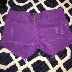 Purple denim distressed shorts