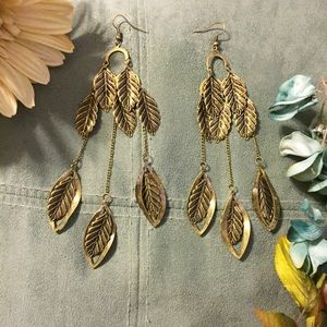 Antiqued gold drop leaf earrings.