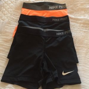 SALE! NIKE Pro athletic shorts Black. Orange. XS.