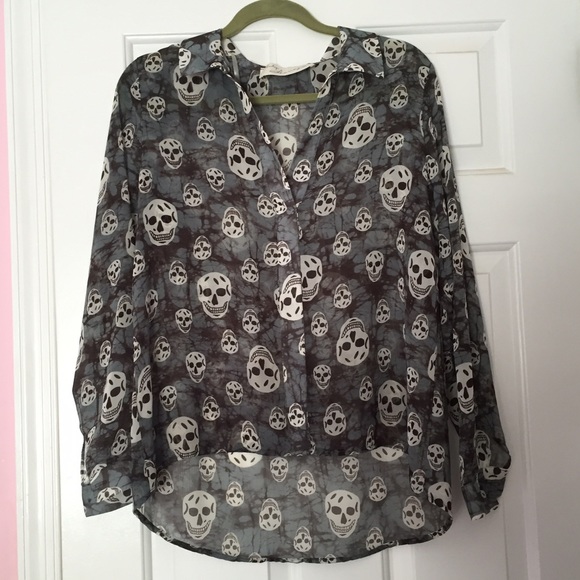 A cool forest green skull blouse.