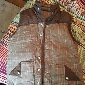 Cute brown reversible vest.