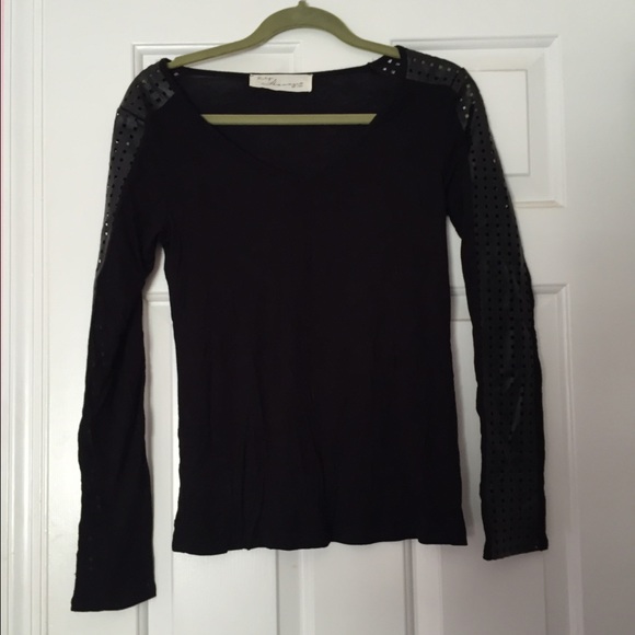 A black long sleeved, fake leather sleeve.