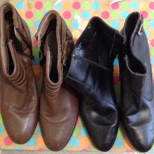 One brown and one black pair of boots