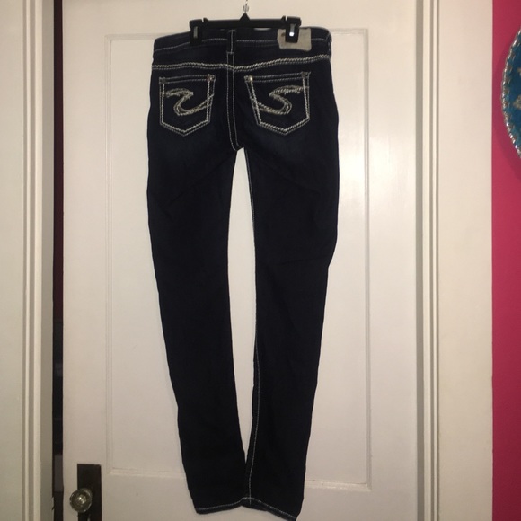 Never worn Silver skinny jeans