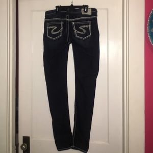 Never worn Silver skinny jeans