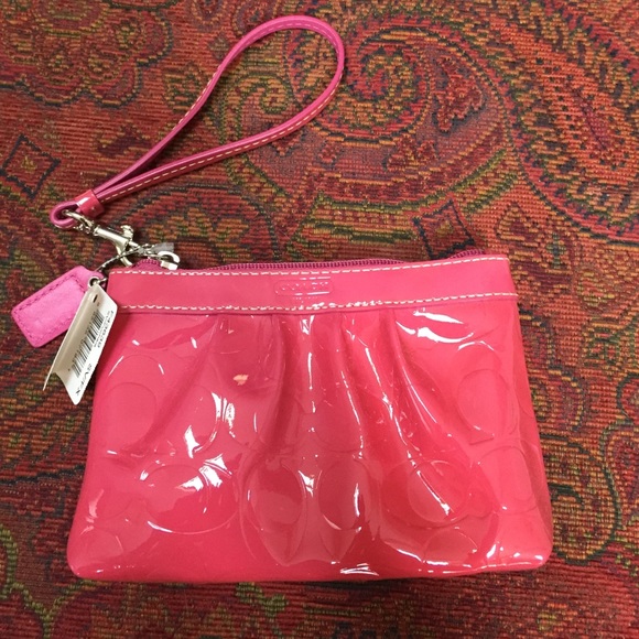 Pink coach wristlet