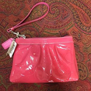 Pink coach wristlet