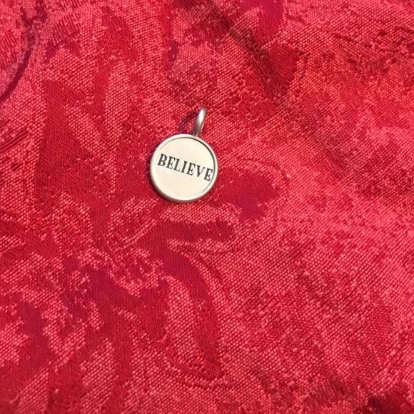 Brighton circular 'believe' charm.