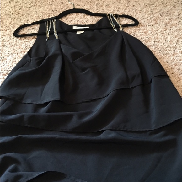 Black with chain shoulder top.