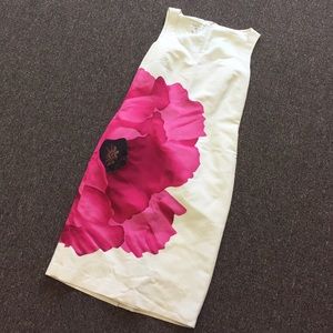 Off white with flower on side