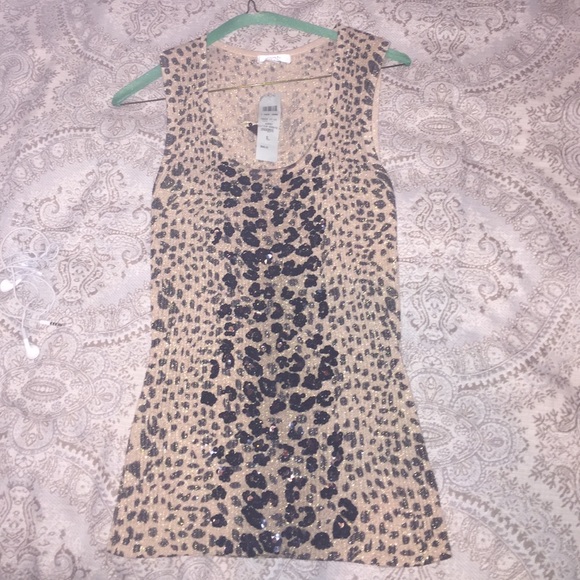 Never worn stylish leopard print blouse by Cache