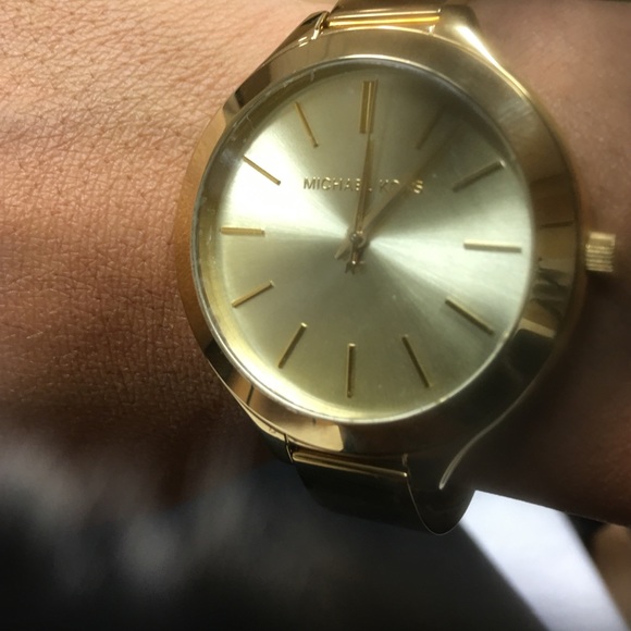 Gold MK watch