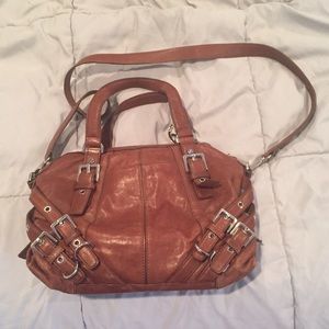Michael Kors brown leather purse.