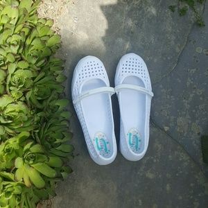 Sketches white strapped shoes