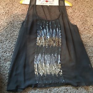 Sheer grey sequence shirt.