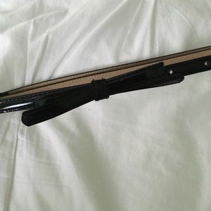 Adorable patent leather bow belt!