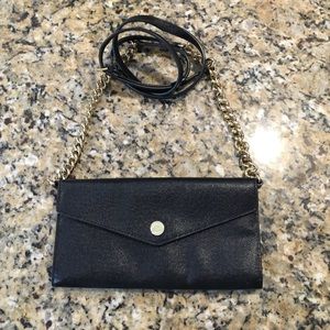 Michael Michael Kors wallet on a chain