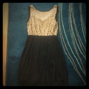 Black and gold sequin dress