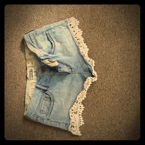 Denim shorts with lace