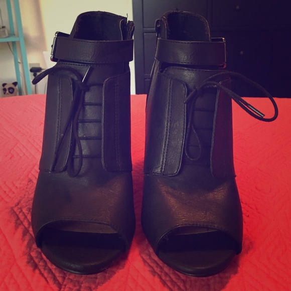 Peep toe leather wedge booties