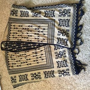 Blue and Creme Pancho with fringe.