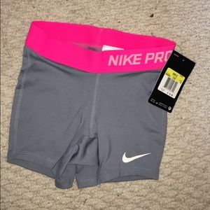 brand new nike pros TAG STILL ON (girls small)